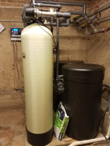 Commercial water softener with brine recovery